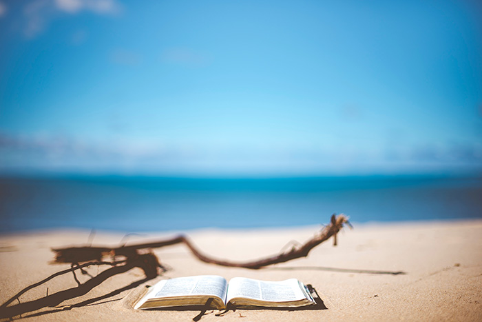 read on the beach in French Polynesia